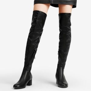 Black over the knee/ thigh high boots. Sexy toe details in the back. Size 6.5.